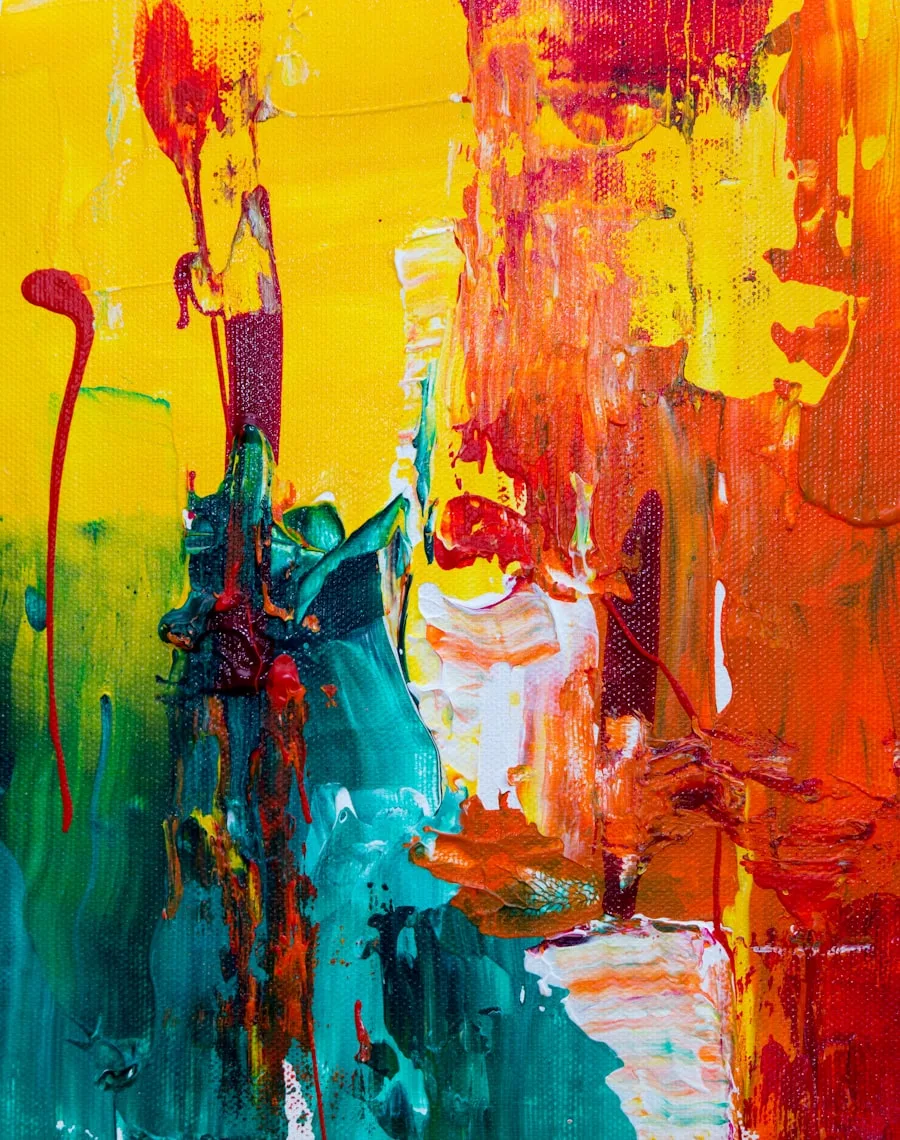An abstract painting in bold yellow, red and teal